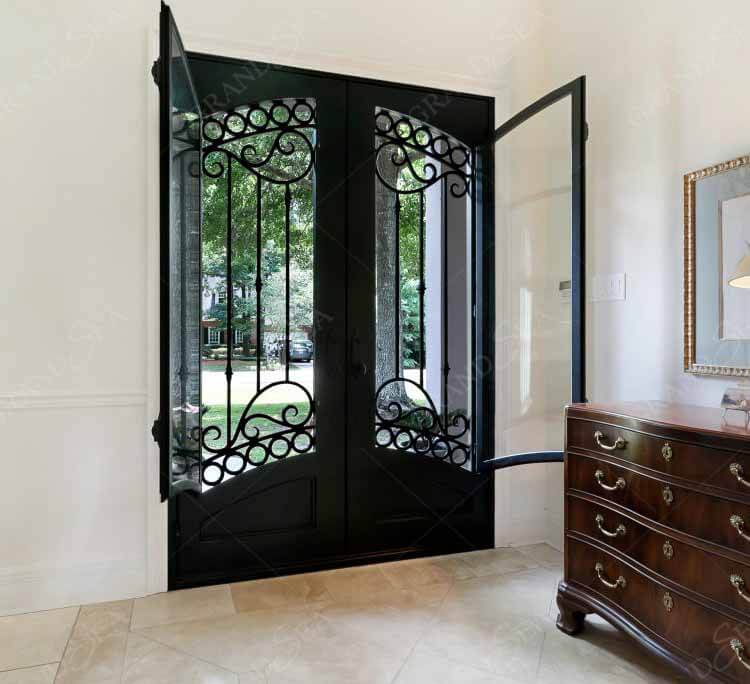 wrought iron door with glass door